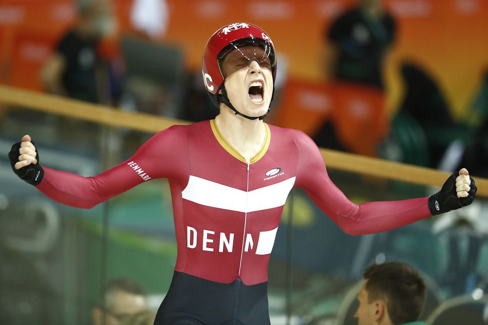 Denmark's Frederik Madsen celebrates after winning bronze in the men's Team Pursuit