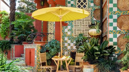 Breakfast in urban garden of Antoni Gaudí’s Casa Vicens