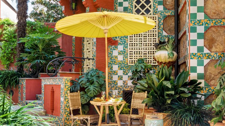 Breakfast in urban garden of Antoni Gaudí’s Casa Vicens
