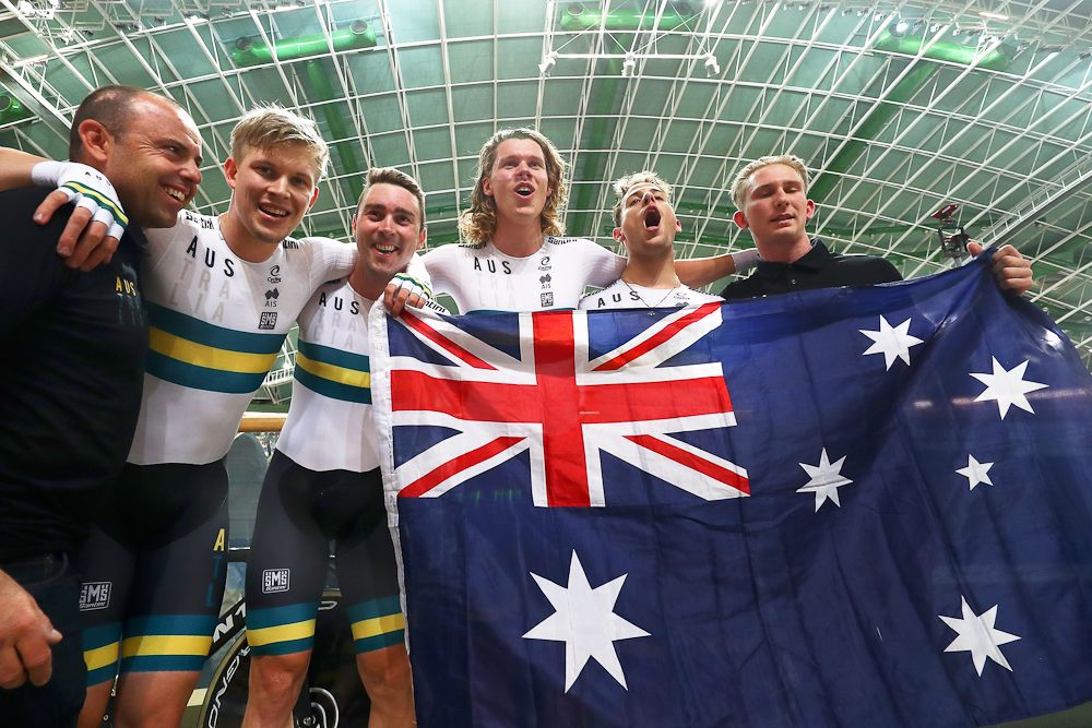 Sam Welsford, Kelland O'Brien, Leigh Howard and Alexander Porter of Australia celebrate winning the gold medal in a world record time in the Men's Team Pursuit Final