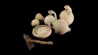 Finds from the excavation include pottery, slingshot stones and weapons.