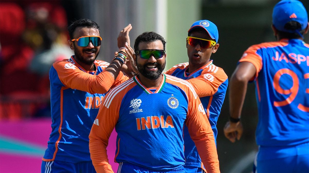 India players celebrate the dismissal of England&#039;s Jos Buttler in the T20 World Cup semi-final.