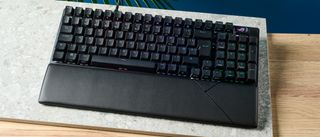 A black Asus ROG Strix Scope II 96 Wireless gaming keyboard