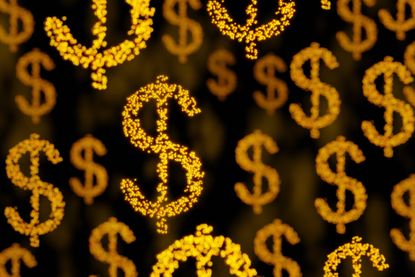 Dollar signs made of golden pellets randomly scattering in black background with bokeh effect.