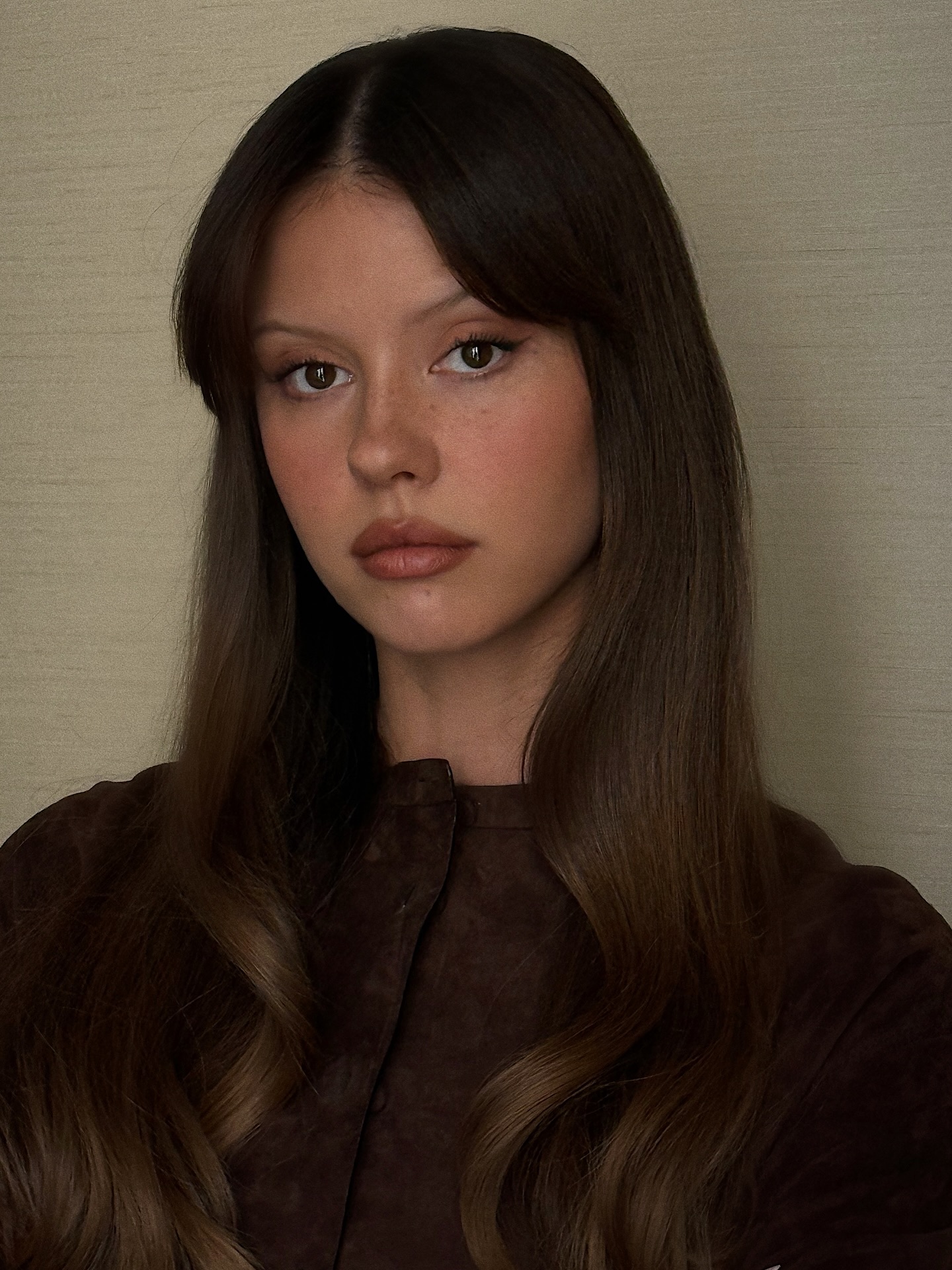 Mia Goth with rich brunette hair colour