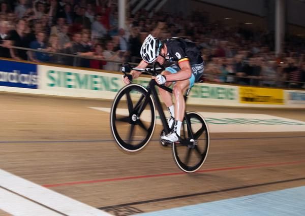 Iljo Keisse crosses the finish line in style.
