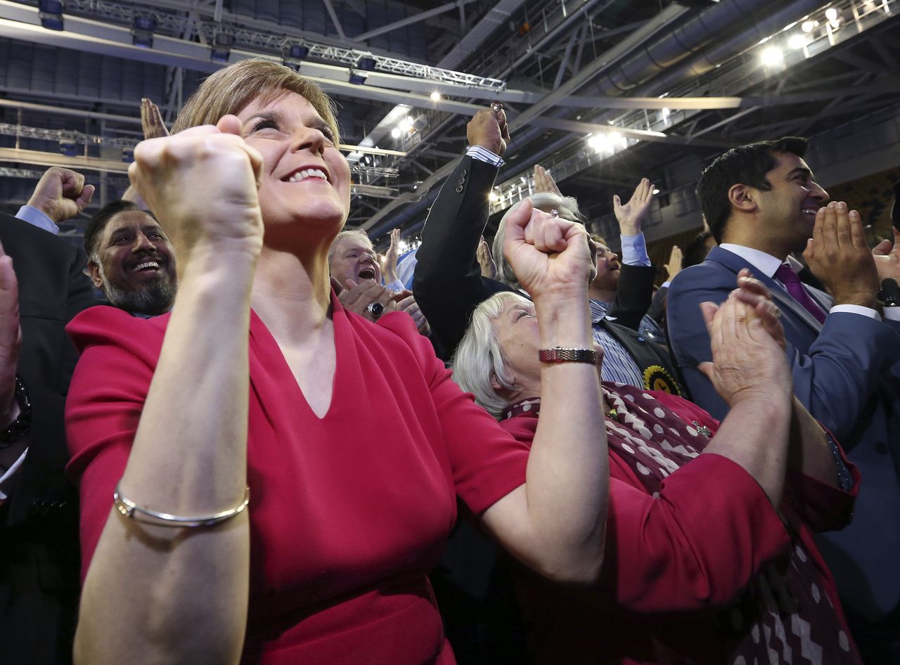 Nicola Sturgeon celebrates.