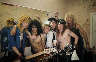 Duff McKagan, Slash, Izzy Stradlin, Axl Rose and Steven Adler of the rock group 'Guns n' Roses' pose for a portrait backstage on a night when they opened up for Johnny Thunders on March 21, 1986 at Fenders Ballroom 5 days before they get signed to Geffen Records in Long Beach, California.