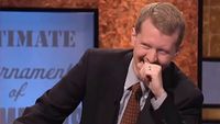 Ken Jennings laughs at Alex Trebek wearing no pants during the Jeopardy! 2005 Ultimate Tournament of Champions.