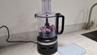KitchenAid 9-Cup Food Processor before chopping onion
