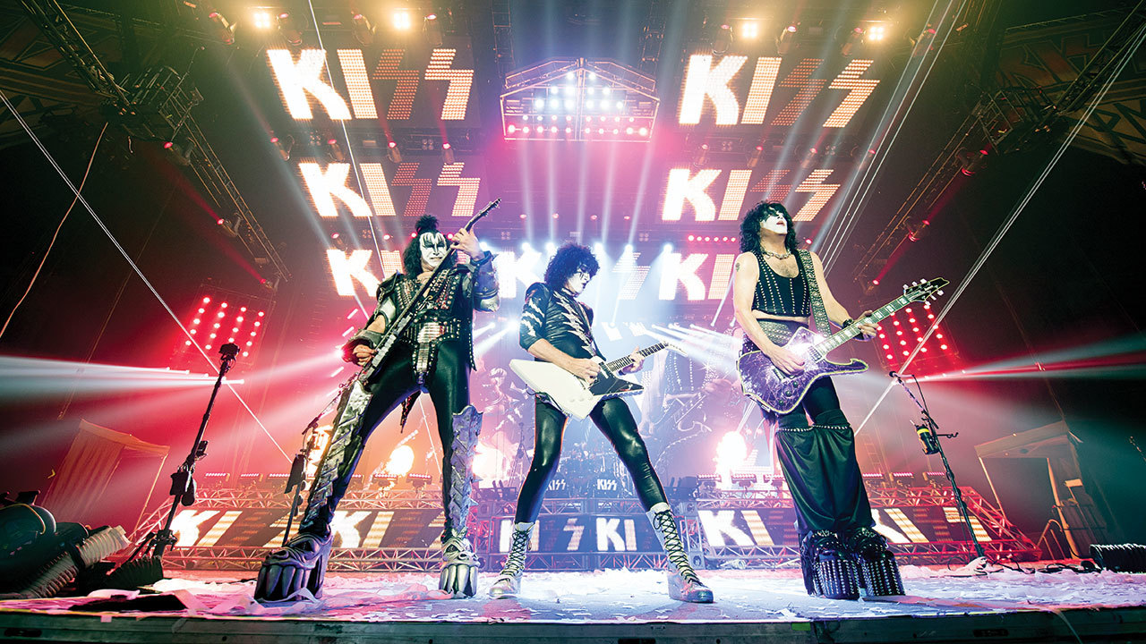 A photograph of Kiss live on stage