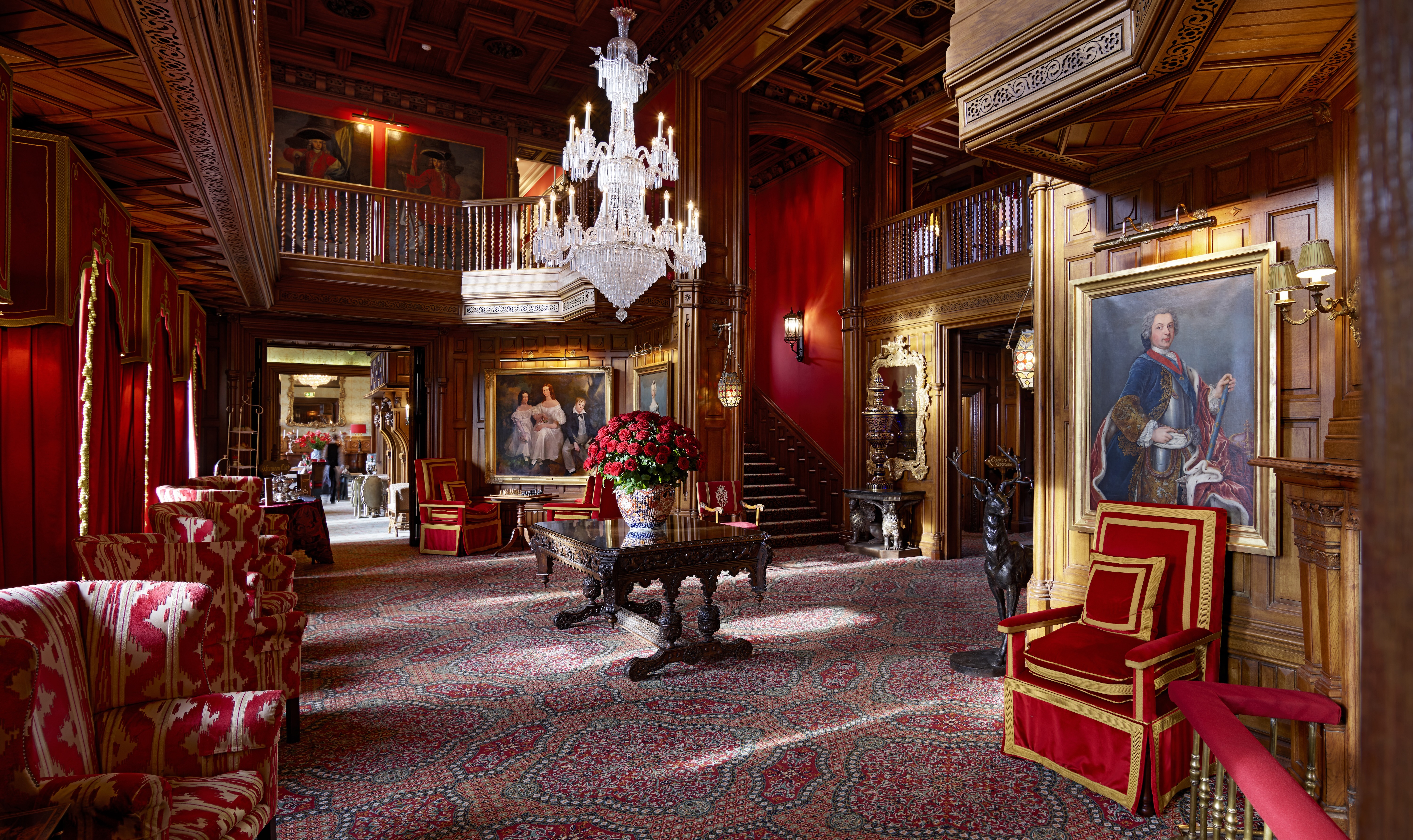 The Oak Room decorated in red velvet at Ashford Castle