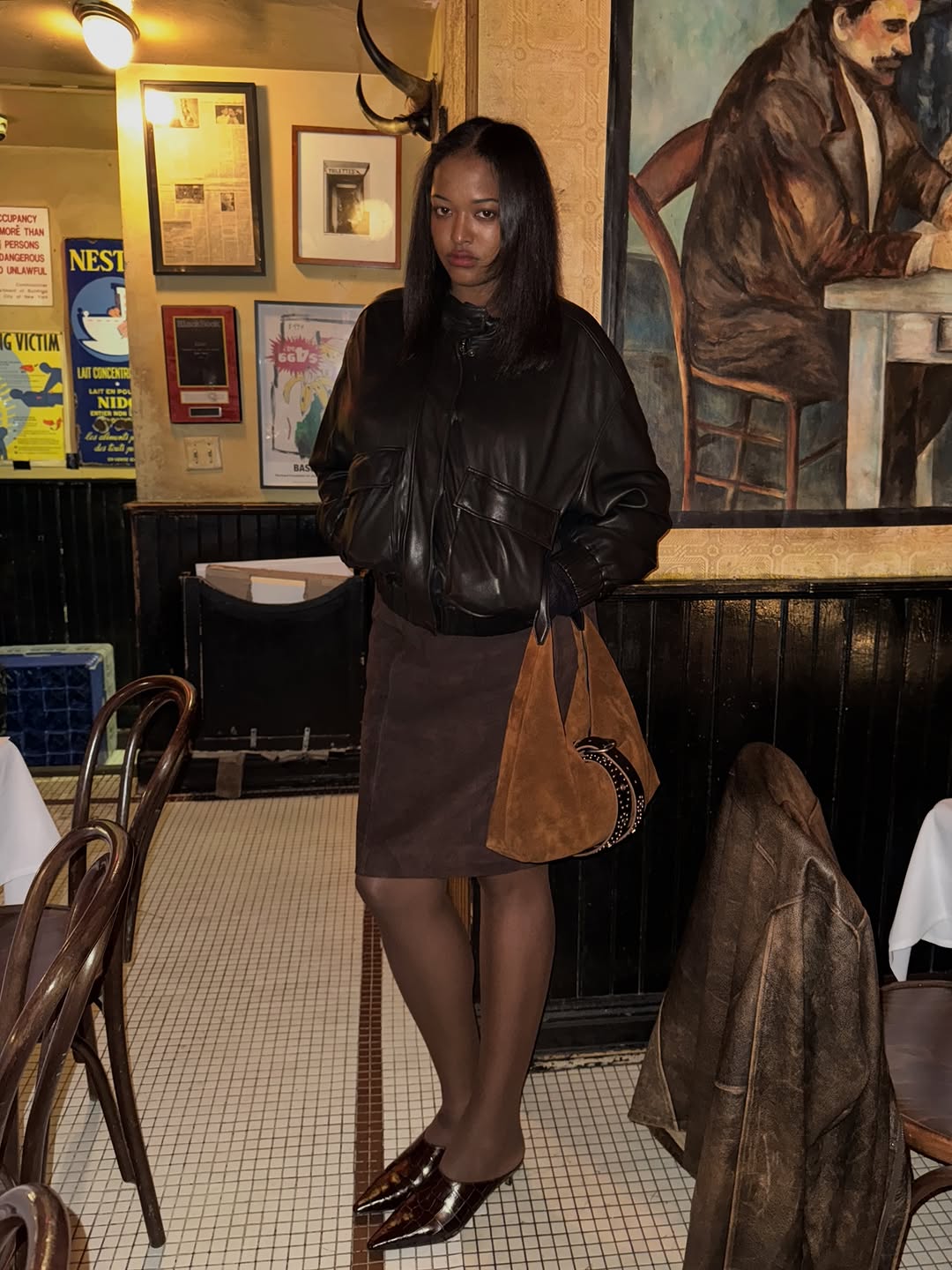 woman wearing black patent leather heels trend