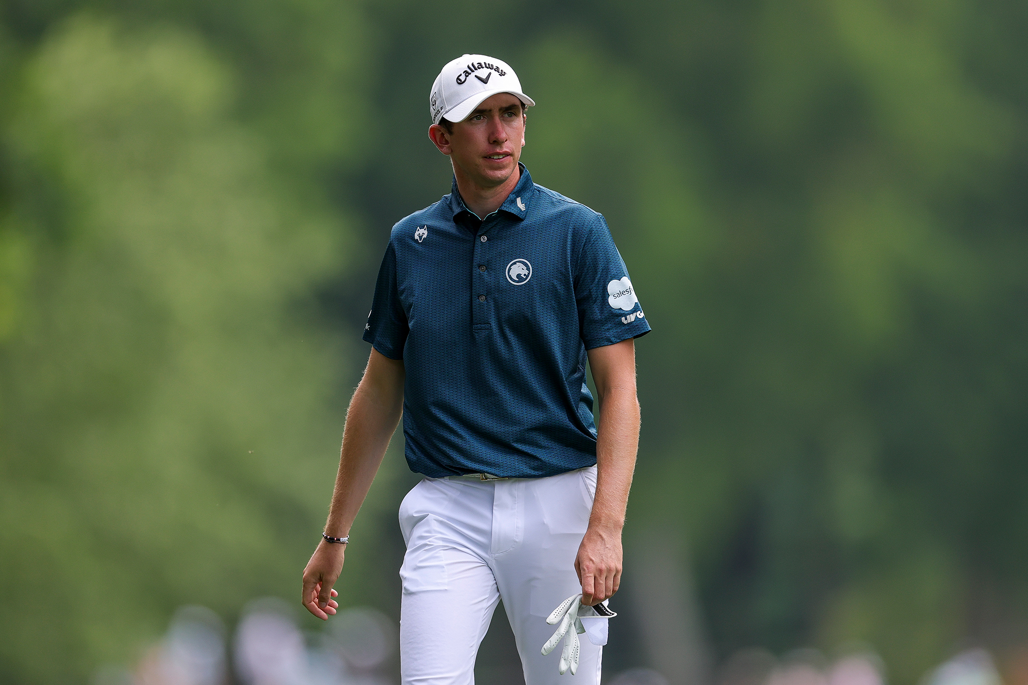 Tom McKibbin walking on the golf course at the PGA Championship, in his LIV Golf Legion XIII clothing