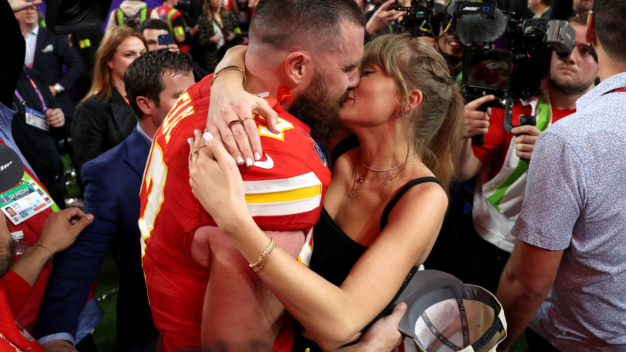 Travis Kelce #87 of the Kansas City Chiefs and Taylor Swift embrace after defeating the San Francisco 49ers in overtime during Super Bowl LVIII at Allegiant Stadium on February 11, 2024 in Las Vegas, Nevada.