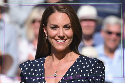 Kate Middleton wearing navy polkadot dress