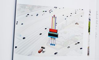 A detail of ' site specific_LOS ANGELES 12' showing cars driving down highways and billboards