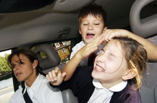 Kids misbehaving in the car