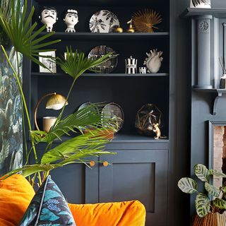 black living room with built in shelving