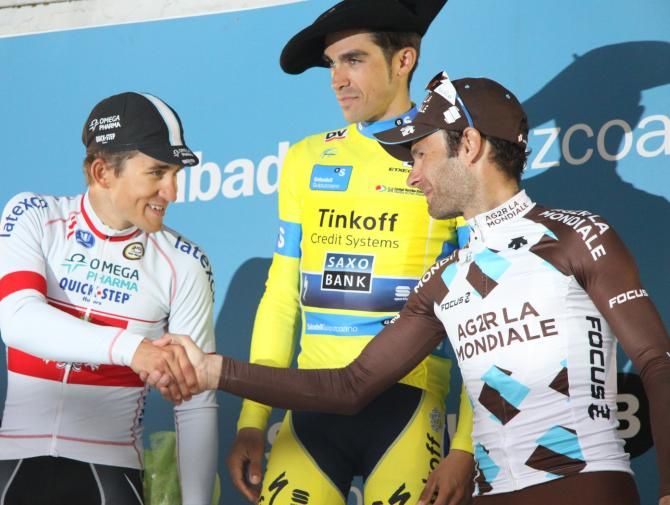 Overall winner Alberto Contador atop the podium