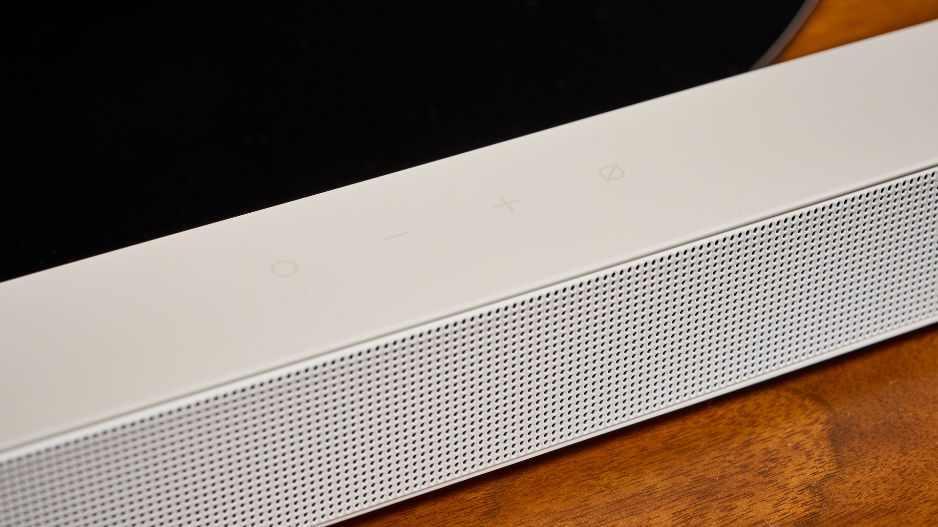 the samsung hw-s801d soundbar and subwoofer in white, an ultra slim soundbar with on-bar buttons, a remote, and separate subwoofer with a black cone