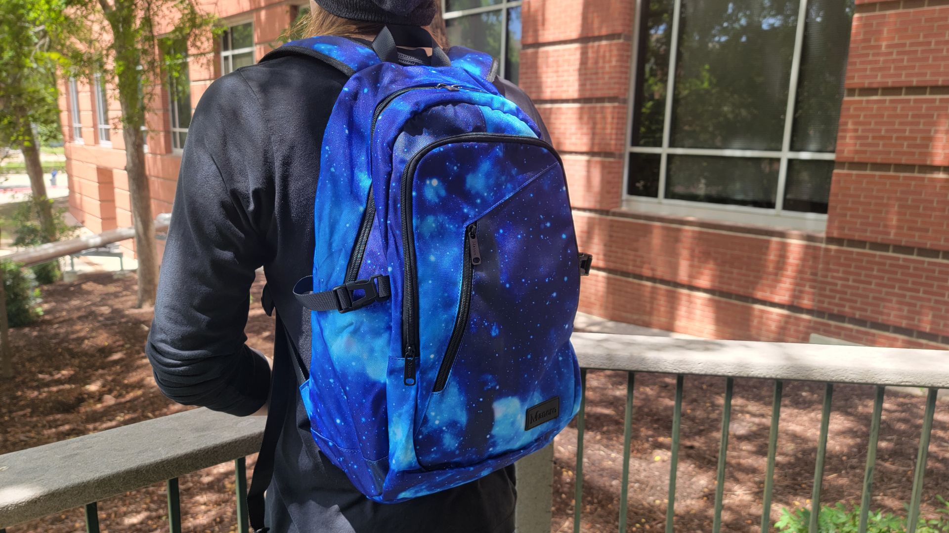 Person wearing Mancro travel backpack