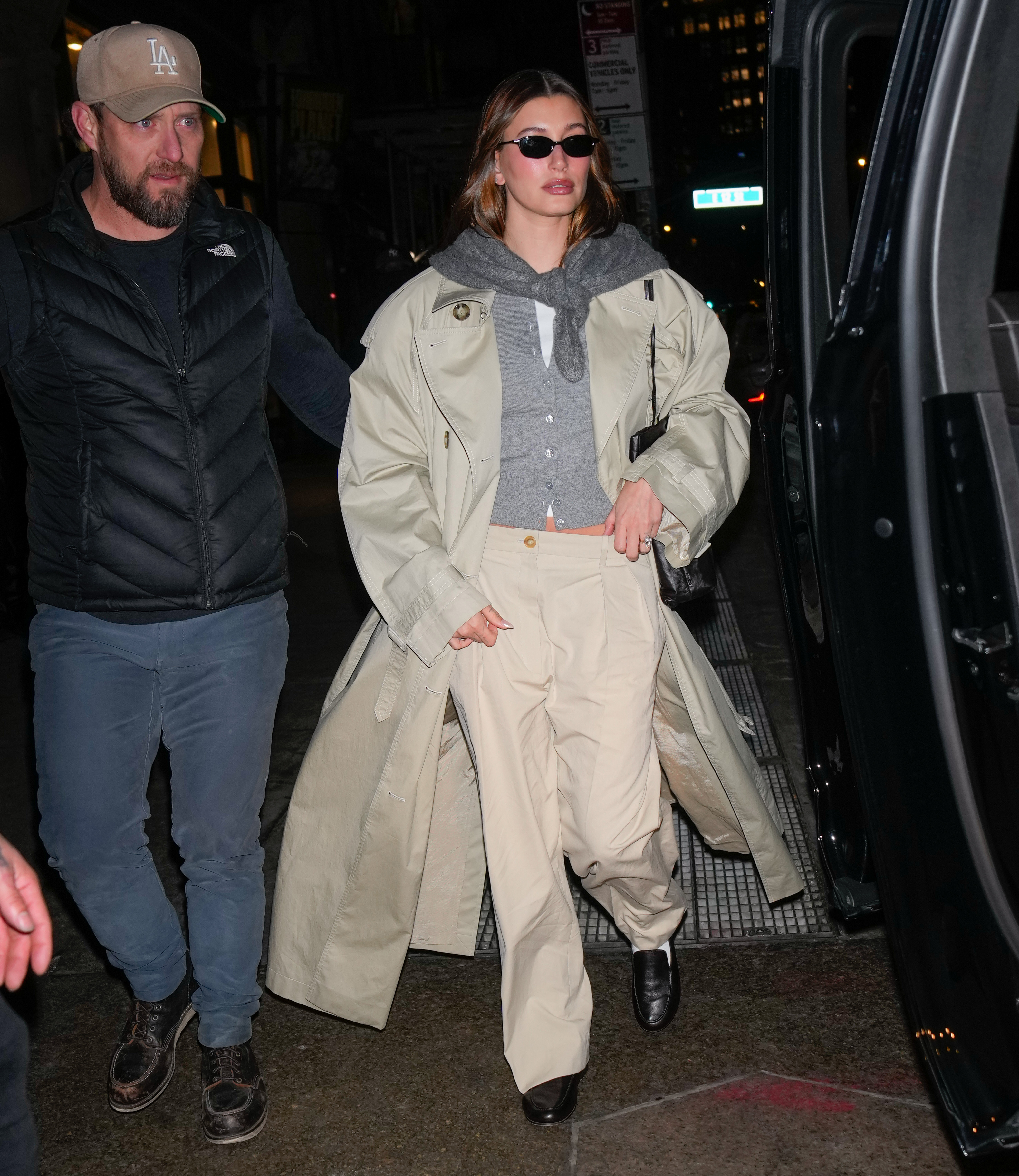 Hailey BIeber wearing a triangle scarf in January 2025