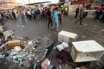 The aftermath of a suicide bombing in Baghdad.