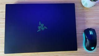 Razer Blade 16 lid closed on a wooden table
