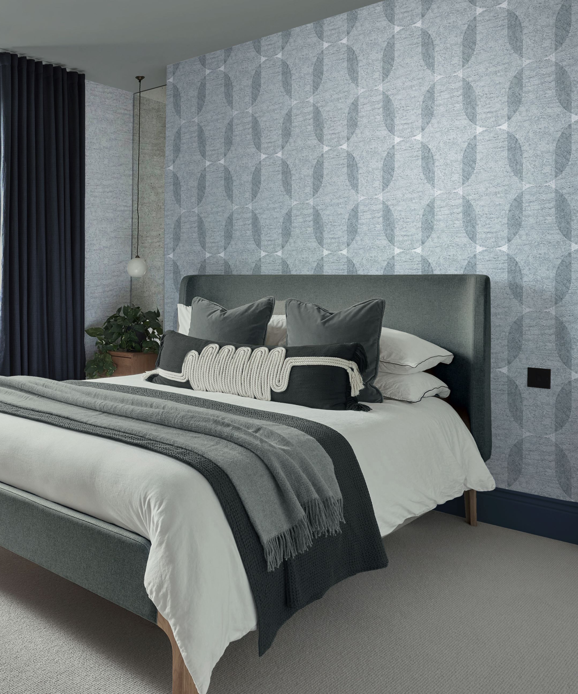 grey bedroom with subtly patterned feature wall in wallpaper