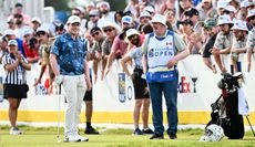 Robert MacIntyre chats with his caddie at the Canadian Open