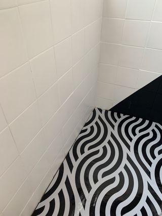 Black and white patterned vinyl flooring