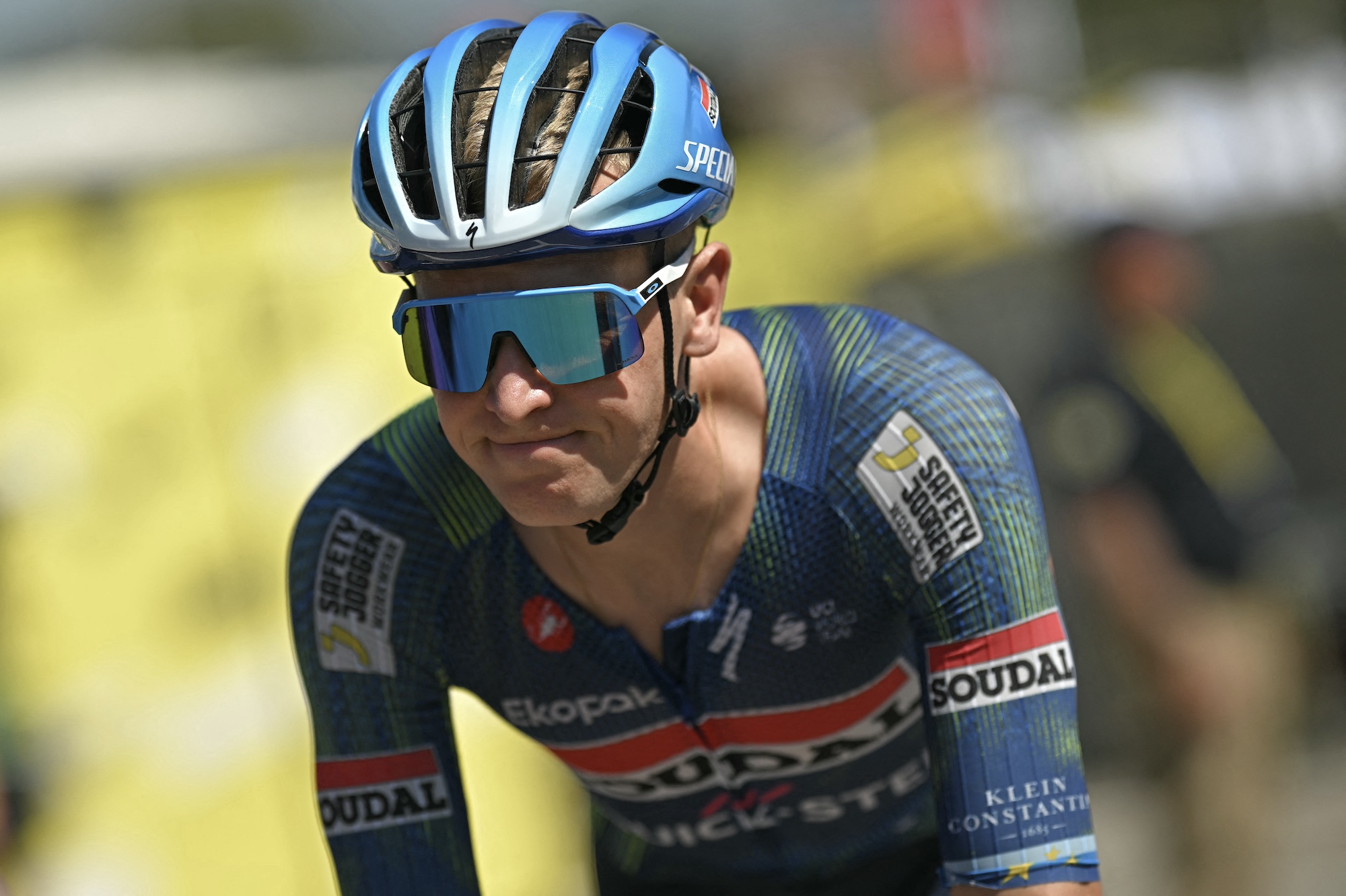 Soudal Quick-Step team's Belgian rider Tim Merlier awaits the start of the 3rd stage of the 113th edition of the Tour de France cycling race, 196 km between Granollers and Les Angles in southern France, on July 6, 2026. (Photo by Loic VENANCE / AFP)