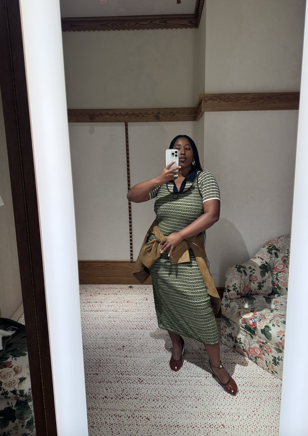 Mecca James-Williams wearing a green Tory Burch striped dress and striped polo shirt