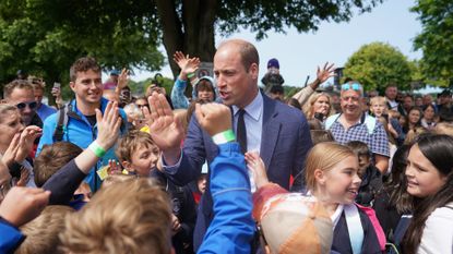 Prince William takes part in a walkabout