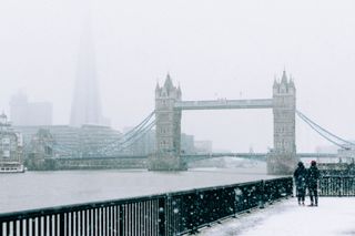 Snow around Tower Bridge in London