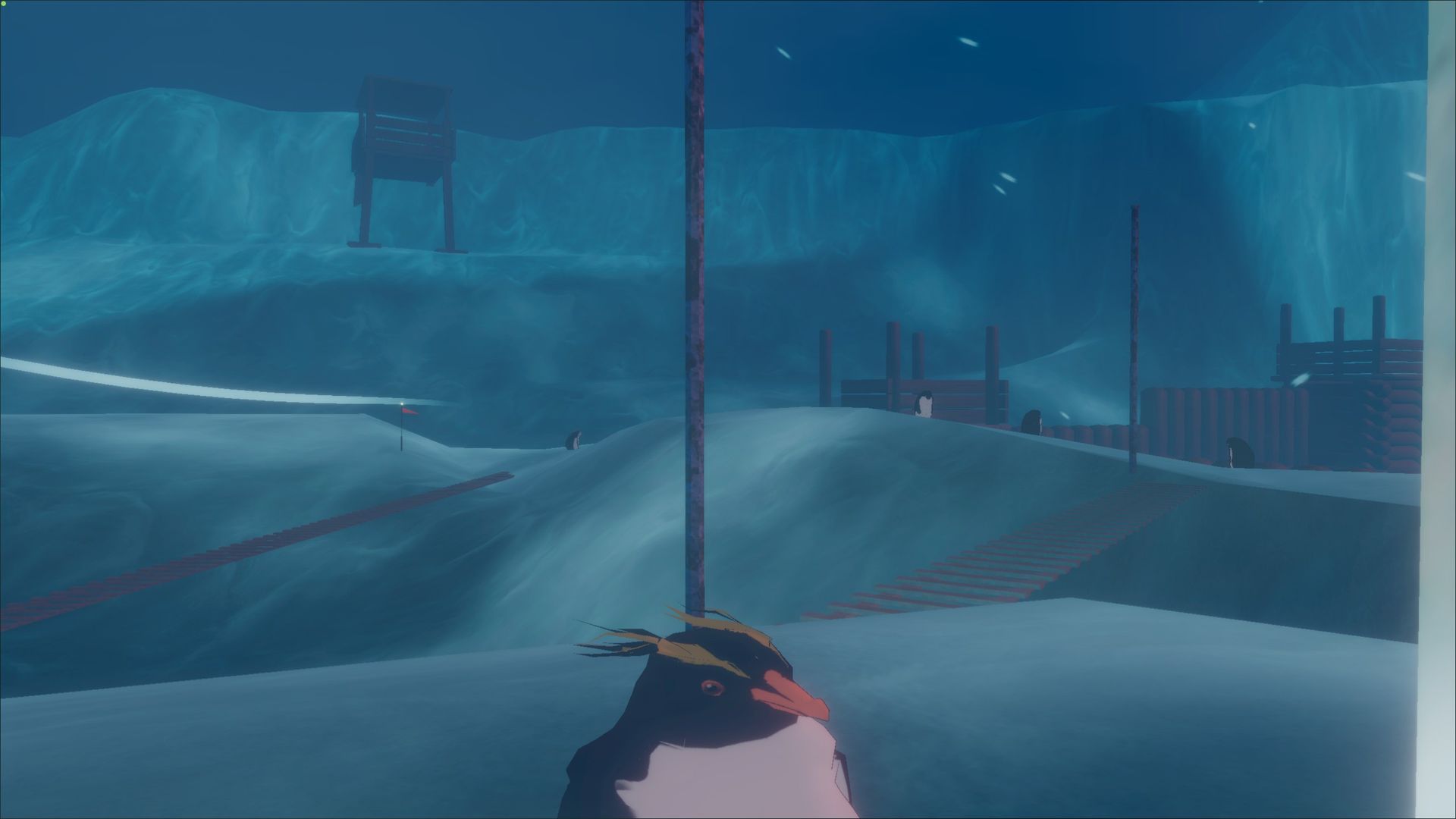 Penguin facing camera with ice fields visible in background