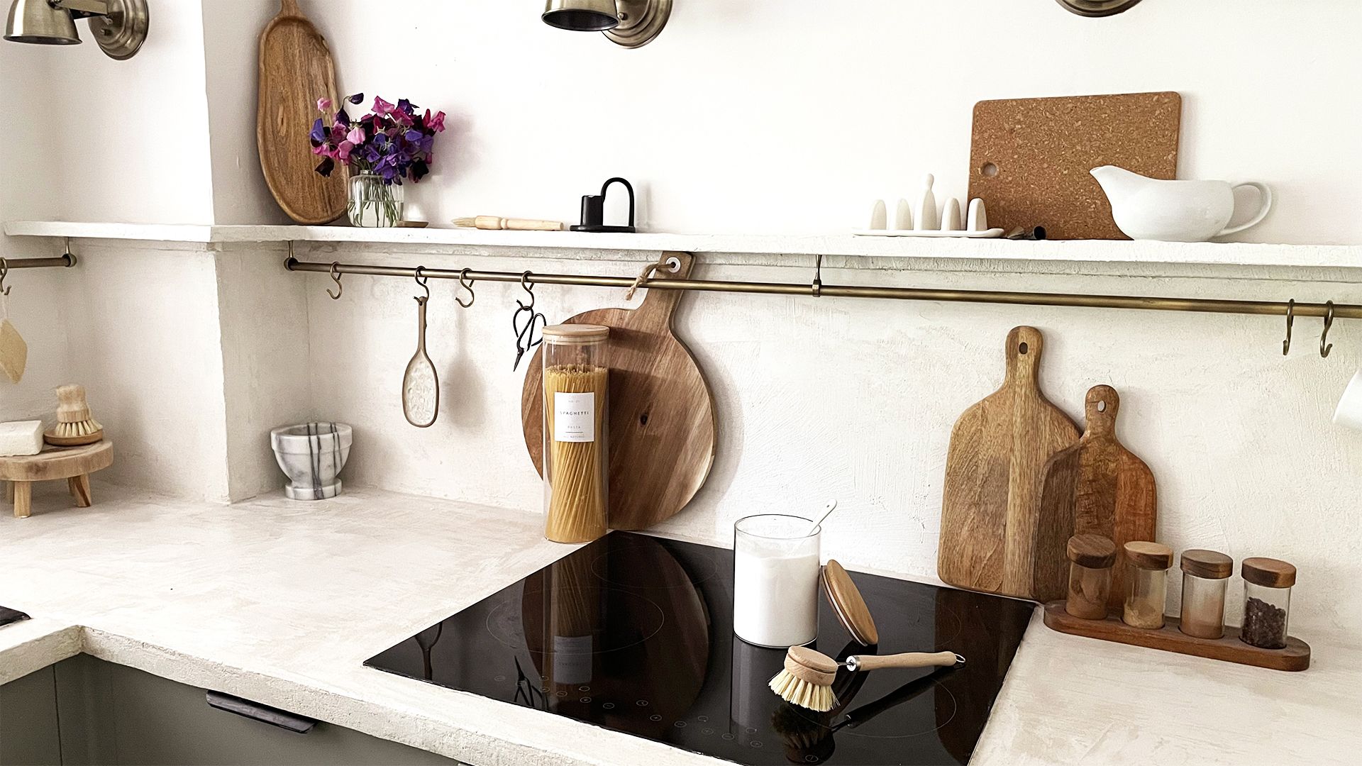 baking soda on a black hob in a kitchen