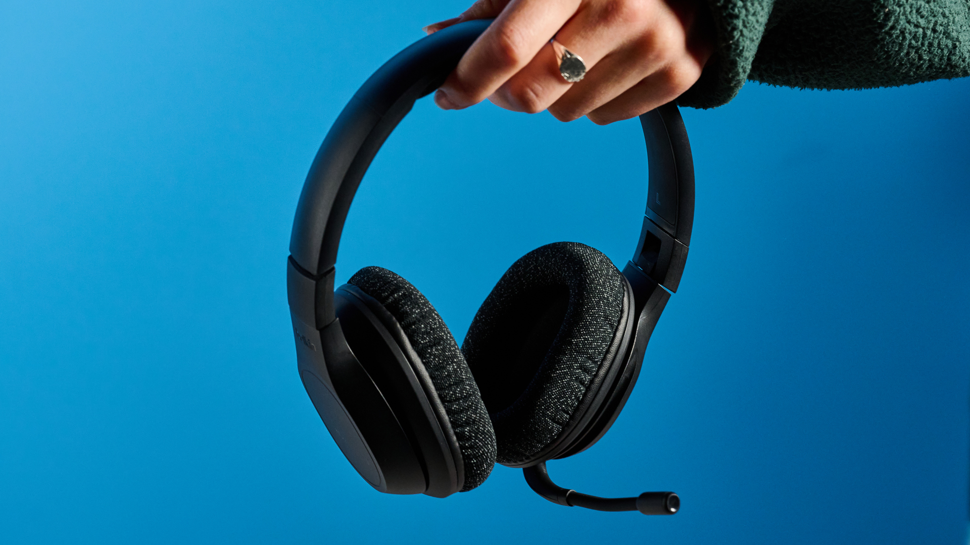 A black Belkin SoundForm Adapt wireless headset