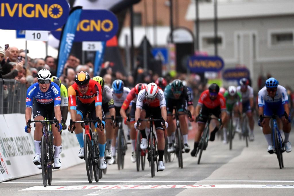 FOLIGNO ITALY MARCH 08 LR Jasper Philipsen of Belgium and Team AlpecinDeceuninck Biniam Girmay of Eritrea and Team Intermarch Circus Wanty Phil Bauhaus of Germany and Team Bahrain Victorious and Simone Consonni of Italy and Team Cofidis sprint at finish line during the 58th TirrenoAdriatico 2023 Stage 3 a 216km stage from Follonica to Foligno 231m UCIWT TirrenoAdriatico on March 08 2023 in Foligno Italy Photo by Tim de WaeleGetty Images
