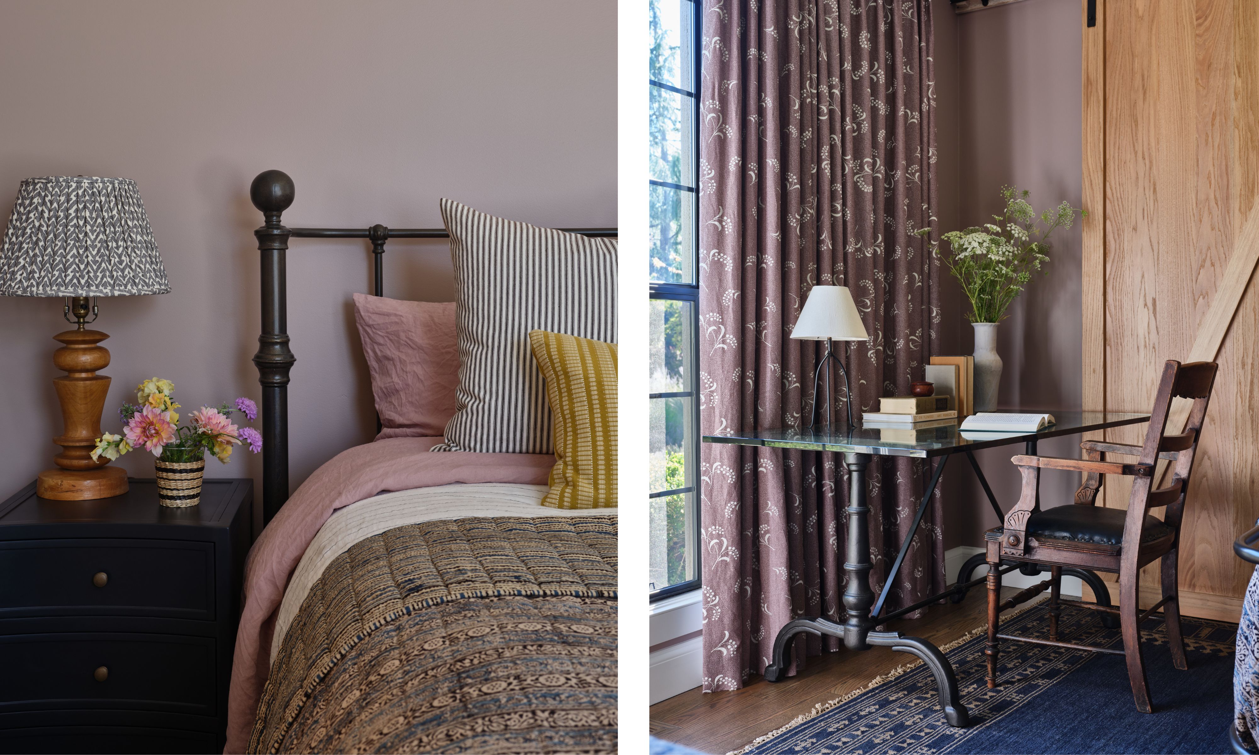 a dusty pink guest bedroom with a wrought iron bed, layered linens and a vintage desk overlooking the vineyard views