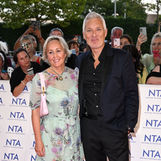 Martin and Shirlie Kemp at the 2023 NTA's. Shirlie is wearing a green floral dress and Martin is in a black suit.
