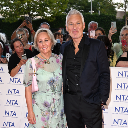 Martin and Shirlie Kemp at the 2023 NTA's. Shirlie is wearing a green floral dress and Martin is in a black suit.