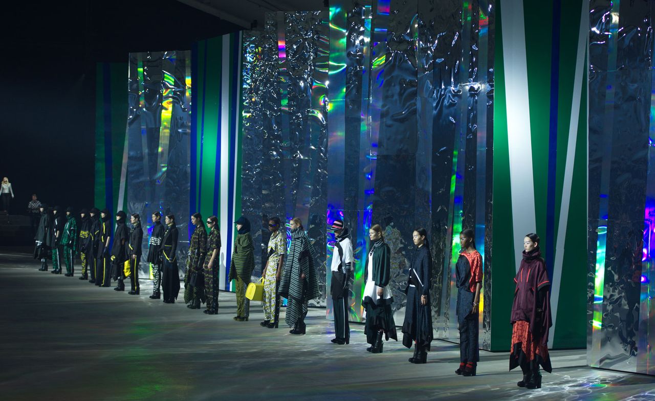 Models in a line up on the runway of Kenzo A/W 2015