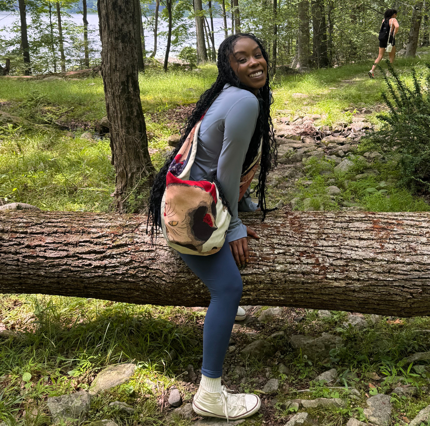woman in the woods hiking