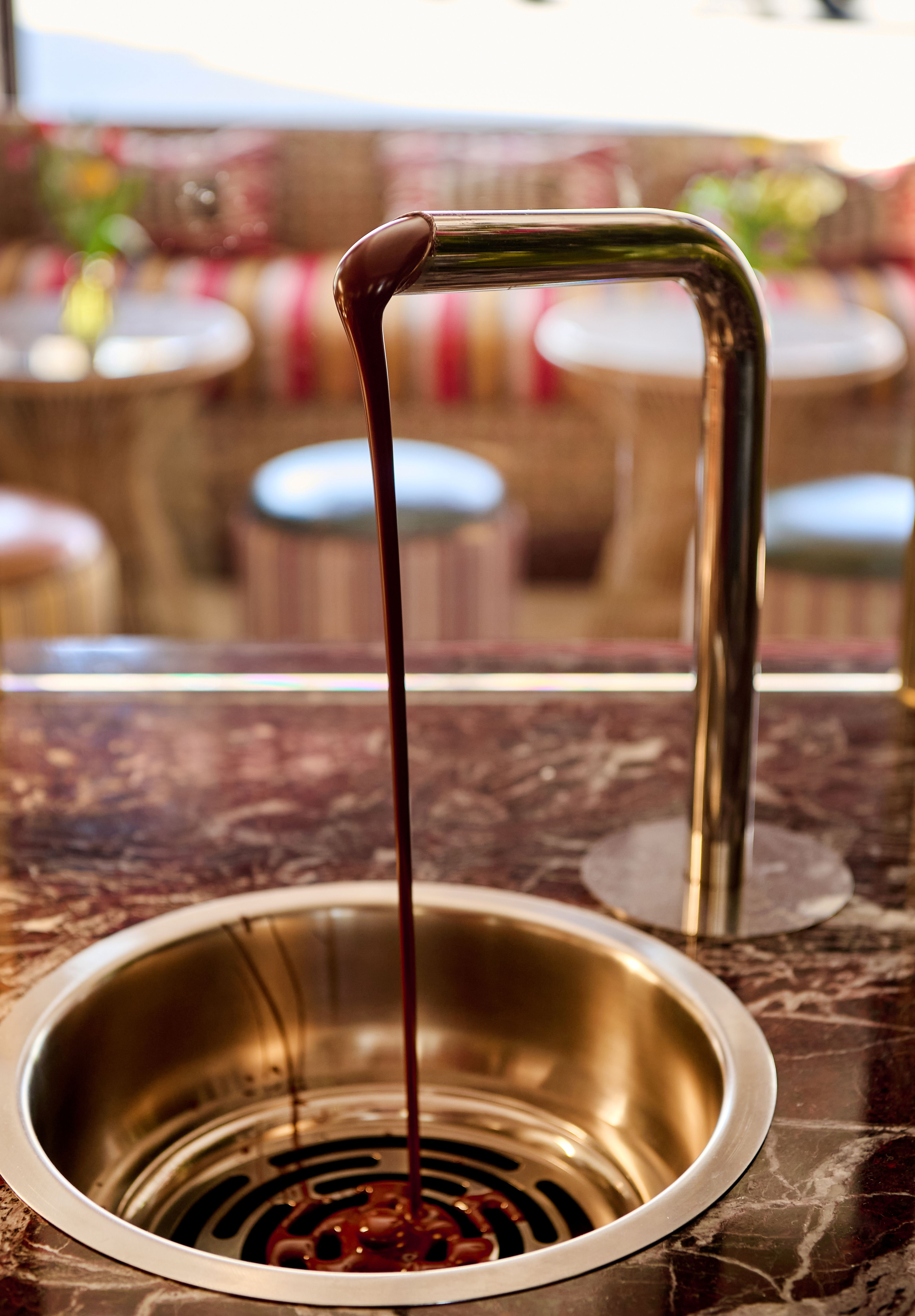 Hot chocolate coming out of a tap at Makers