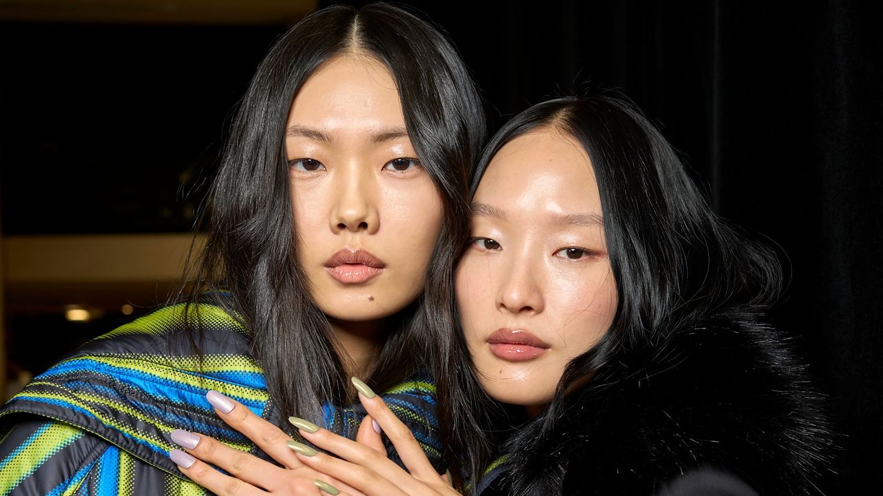 two models standing, one with a hair gloss, one with a hair glaze 