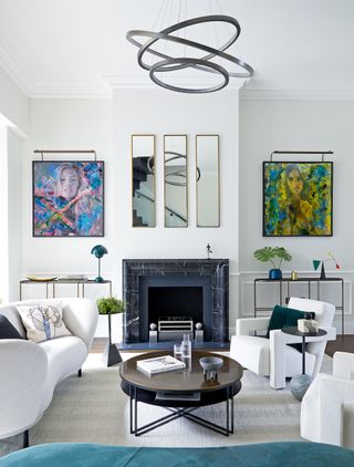 White living room with artwork