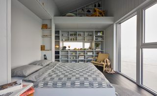 bedroom with open shelf