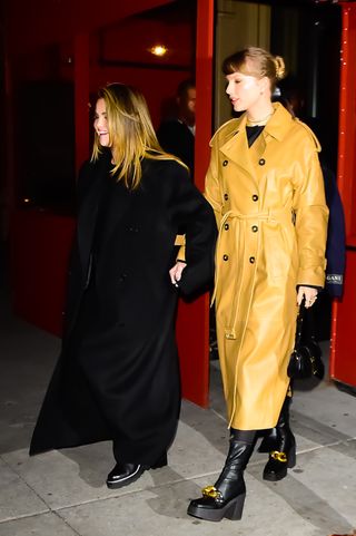 Selena Gomez and Taylor Swift walk in New York City wearing similar coats